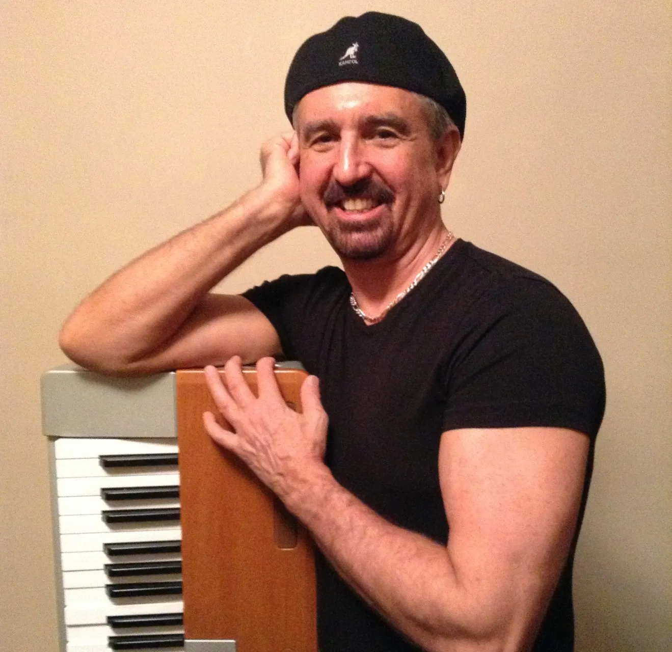 Greg Hatza playing the keyboard for Melodic Intersect